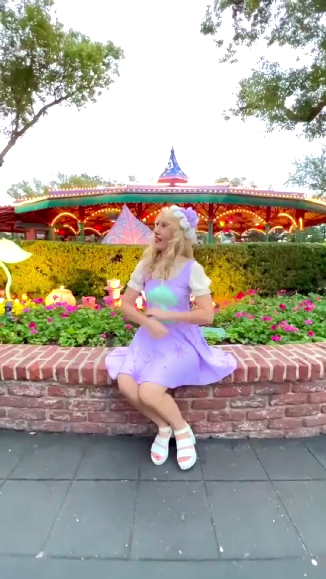 Our model wears a fun mad tea party dress inspired by the classic Disney teacup ride. Perfect for chasing the white rabbit down to wonderland, this style is a must have for your next Disney trip!